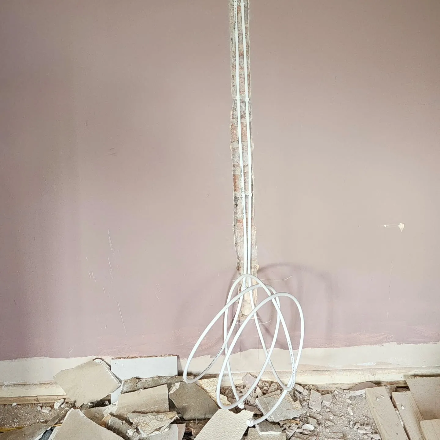 A broken light fixture sitting in a room.
