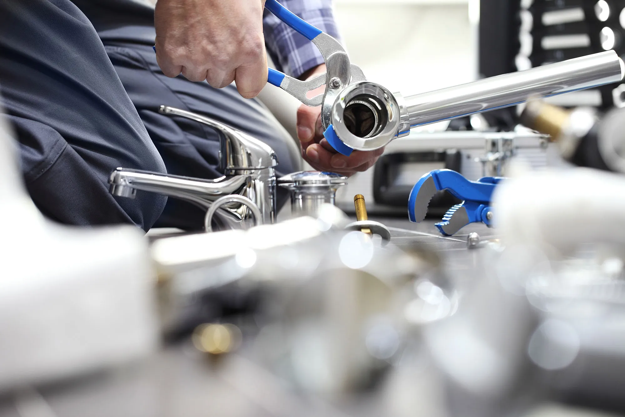A close up of a person working on a machine.